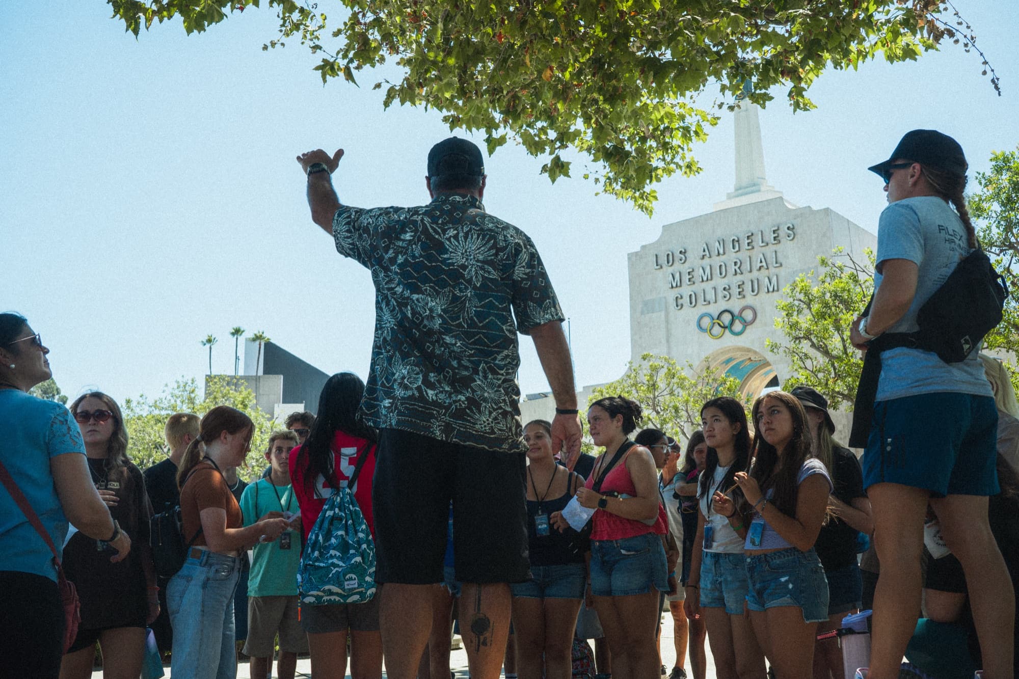 A GO28+ outreach gathering outside the Los Angeles Memorial Coliseum